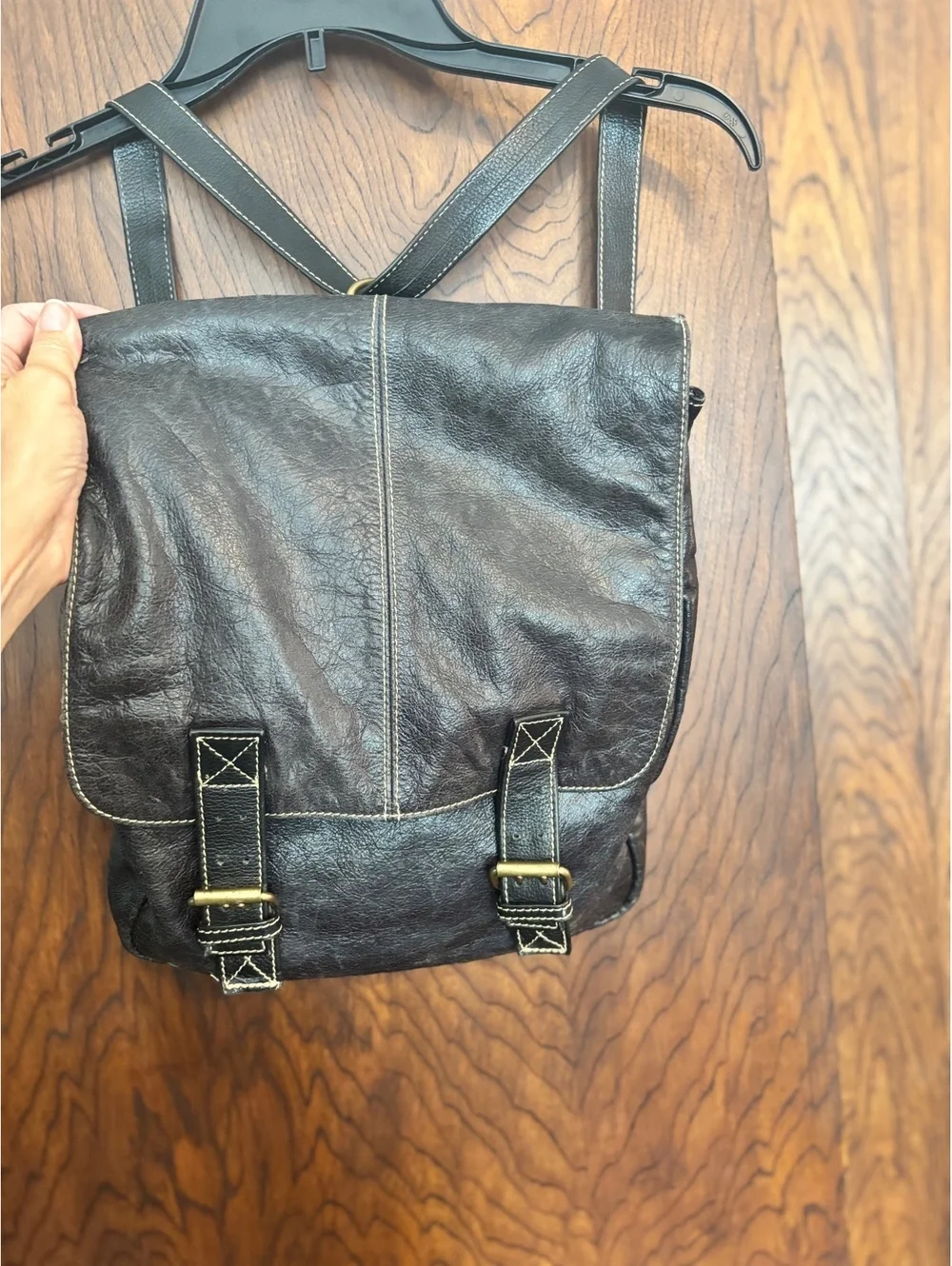 Black Leather Crossbody Backpack with Buckle Closure